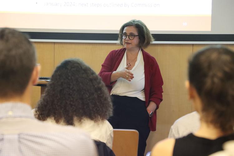 Dr. Sophie Meunier giving a talk in Singapore